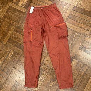 Outdoor Voices russet rust orange windbreaker pant Medium *new with tags *